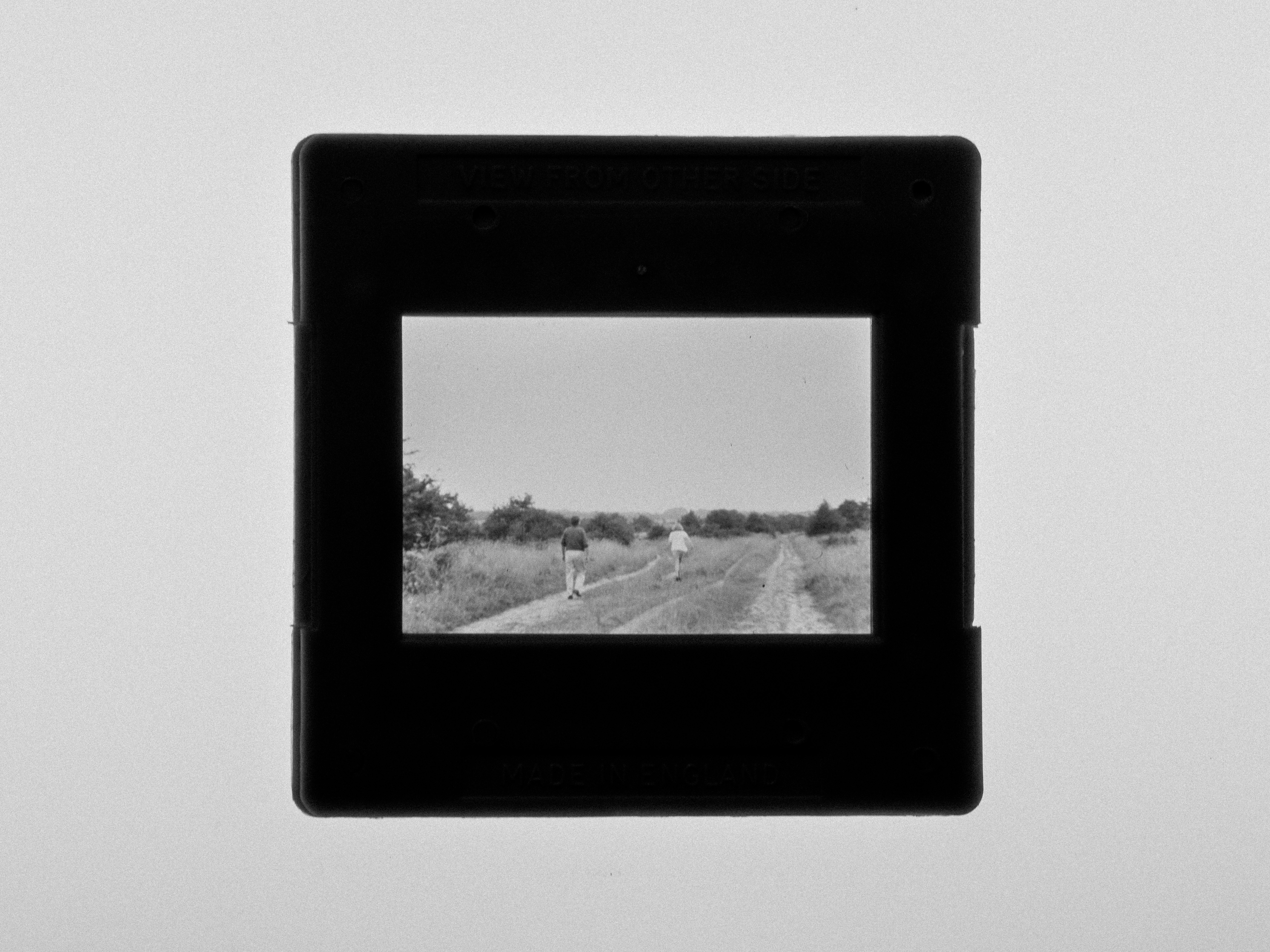 black wooden frame on white wall